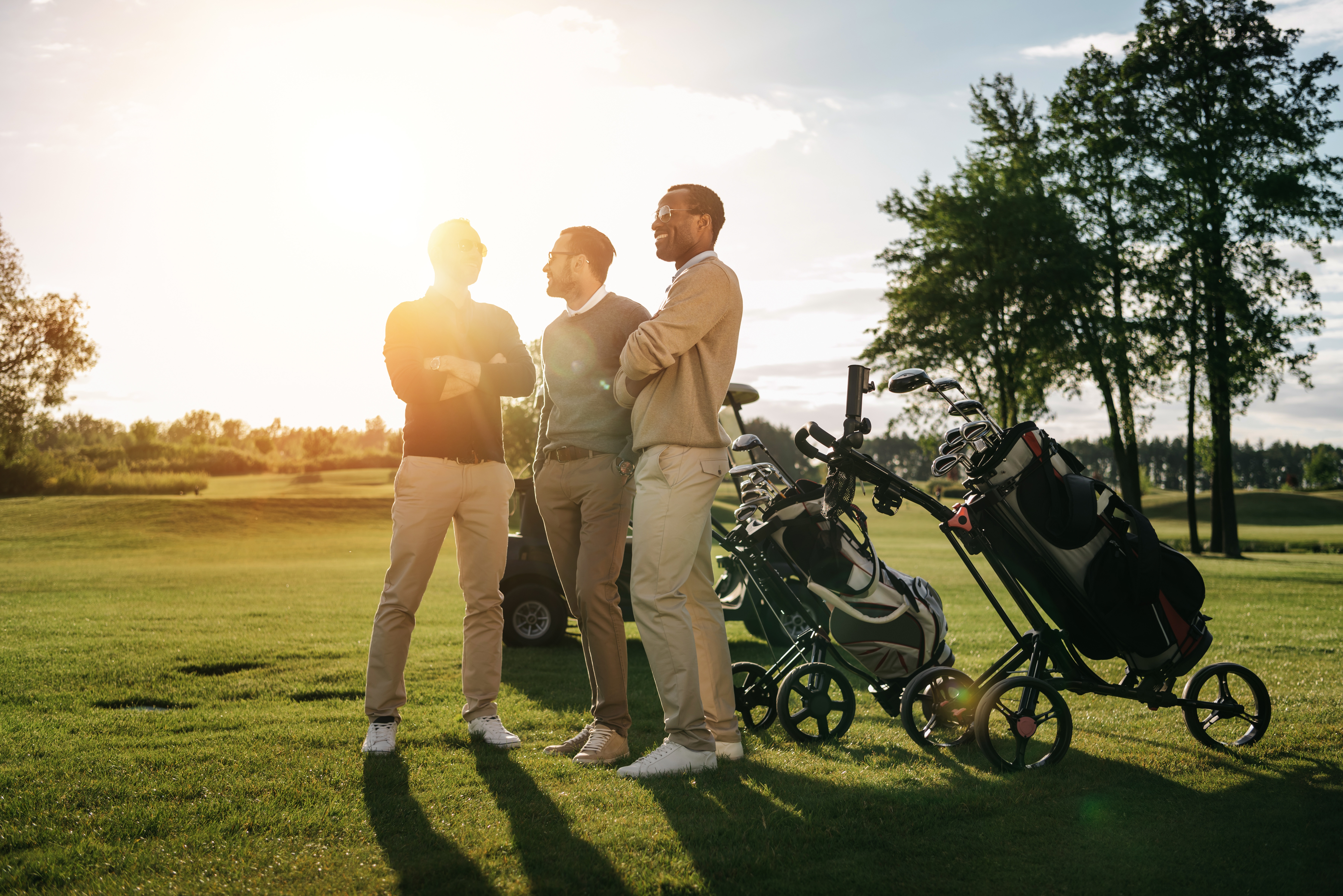 3_golfers_on_course