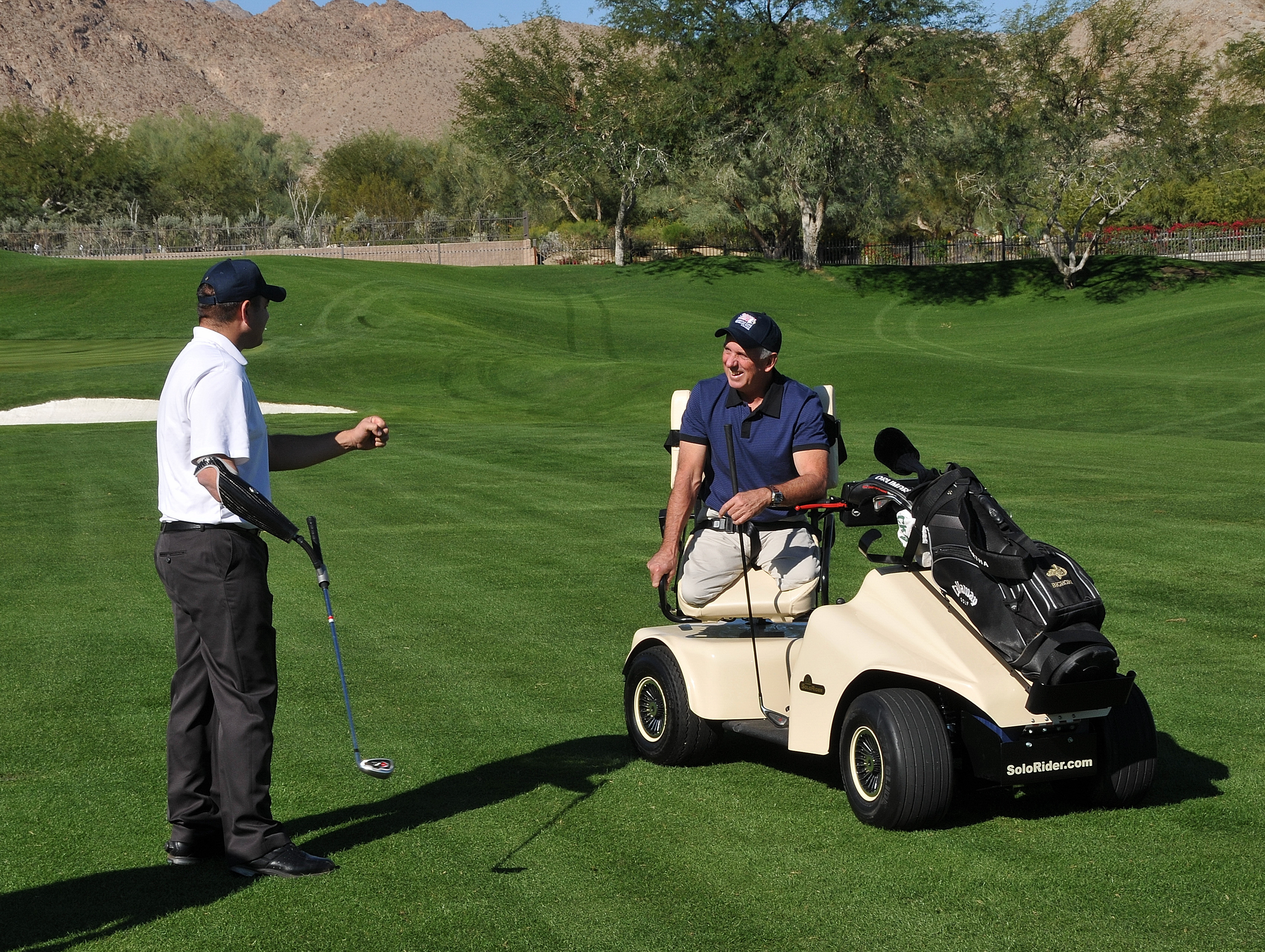 Amputee veterans golfing