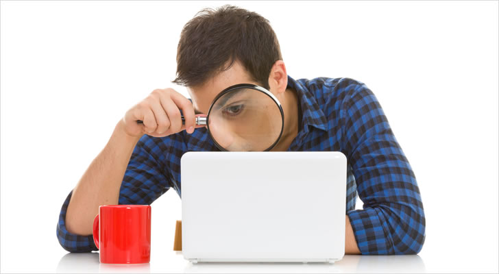man looking at laptop stock art