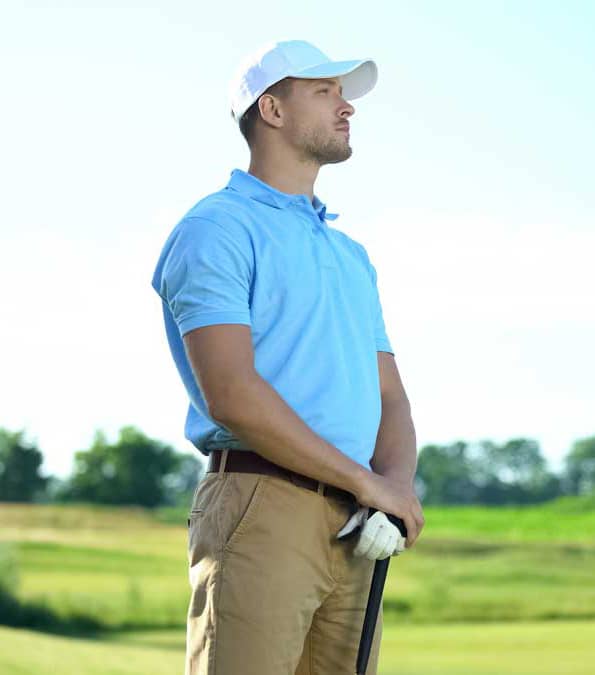 golfer in blue shirt